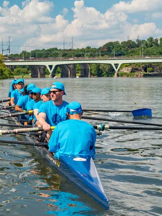 Executive MBA students rowing in Philadelphia as a team building exercise
