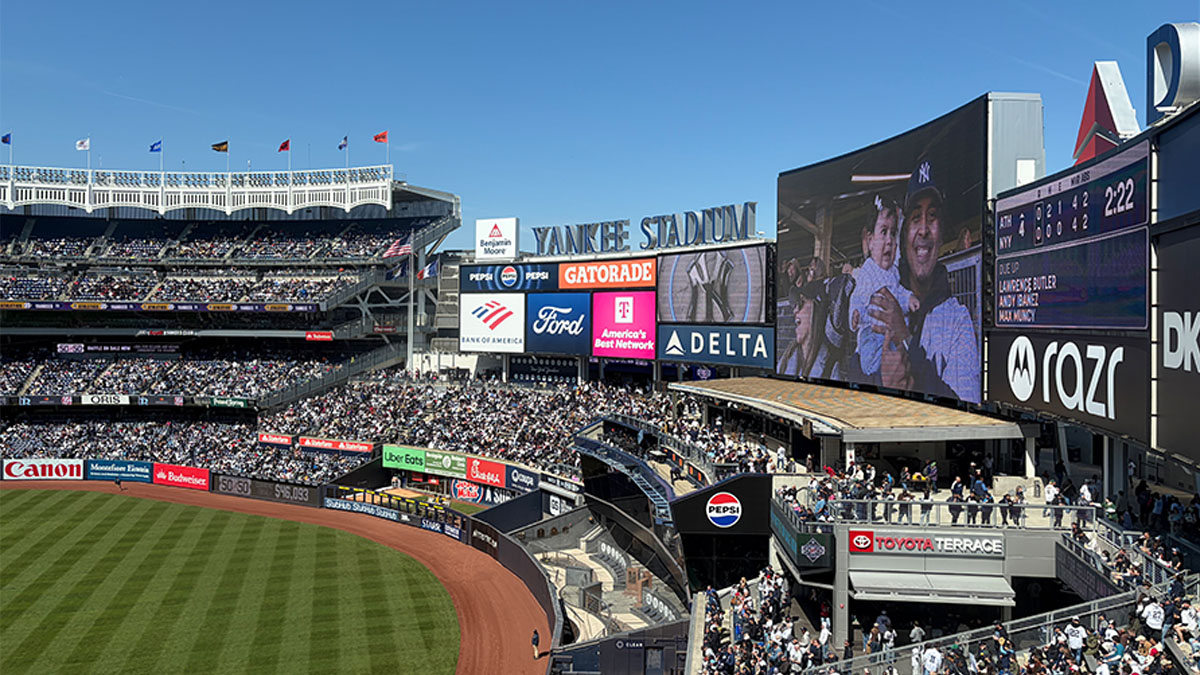 View of outfield of Yankee Stadium, with video board visible at the center