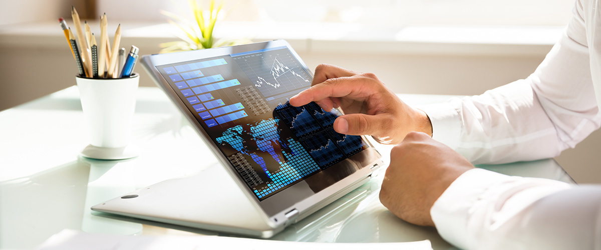 a person interacts with data on a tablet