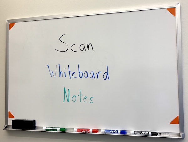 Photo of a whiteboard with handwritten notes
