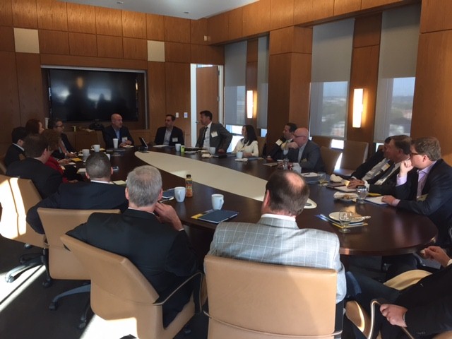 faculty participate in a roundtable event