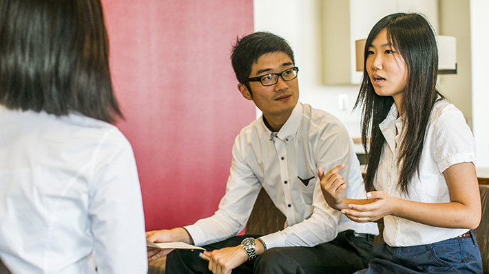 PhD Students having a discussion