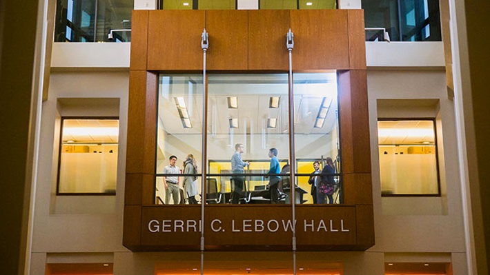 Group meet in Atrium conference room in Gerri C. LeBow Hall