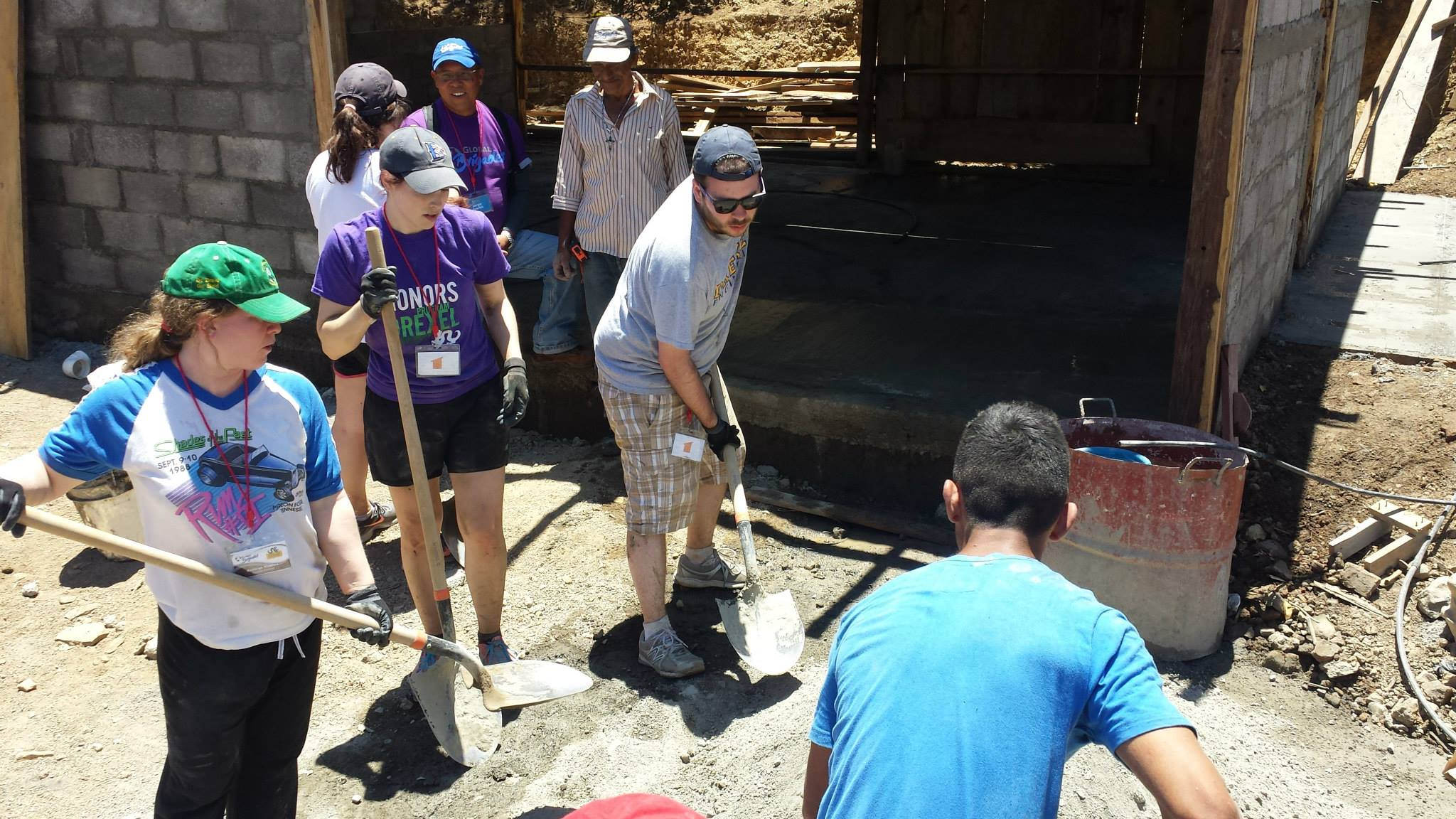 volunteers working with shovels 