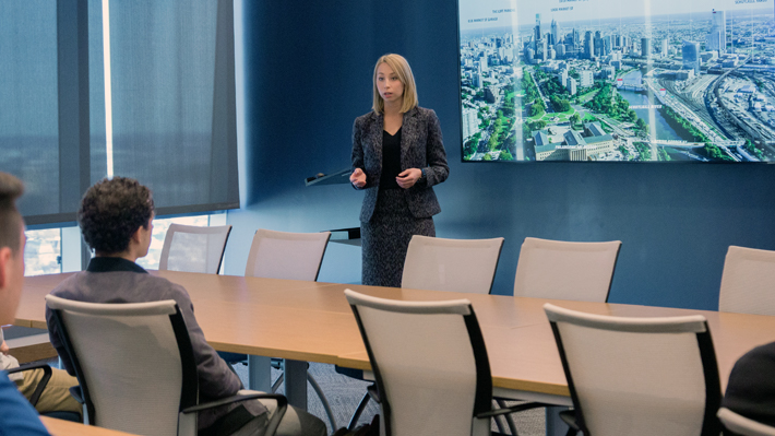 Bethann Coradino presents university city development plans Woman explains Real Estate Management and Development program to students