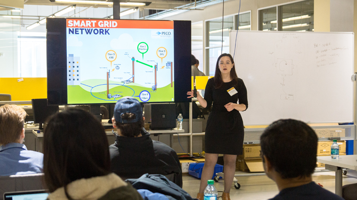 Woman presents PECO Internet of Things Technology to students