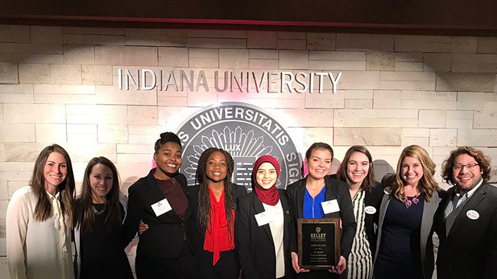 BRIDGE students stand with Target Execs for group photo