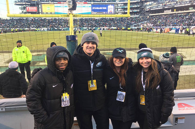 Students pose in the stadium at Eagles Super Bowl Game