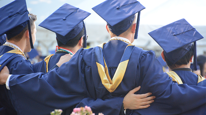 Graduate students posing for photos