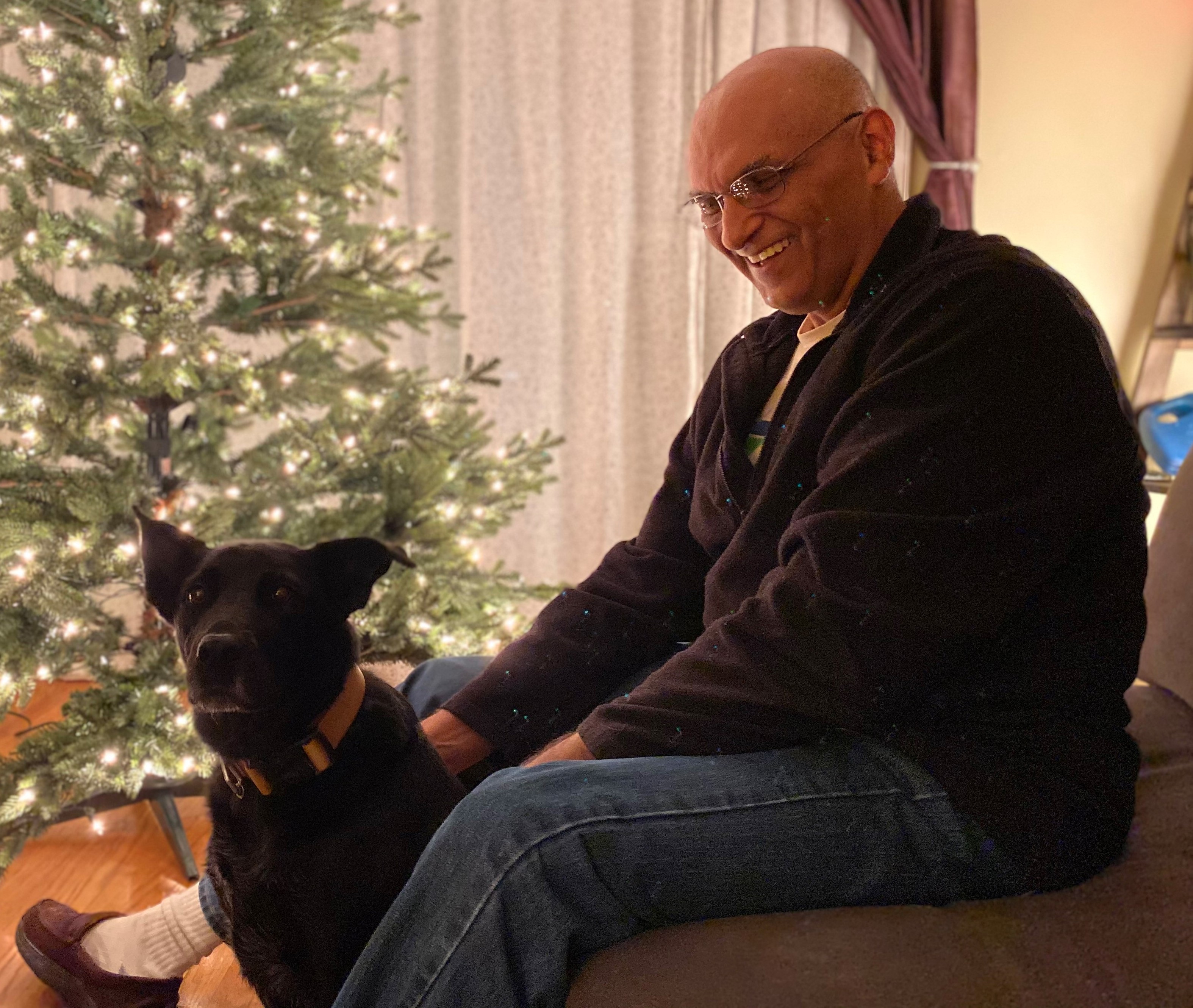 Vice Dean for Research Raj Suri, PhD, with his dog Shadow Vice Dean for Research Raj Suri, PhD, with his dog Shadow