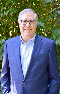 Headshot photo of George E. Peterson