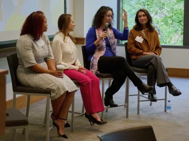 The panel talking during Inclusive Impact Day 2023.