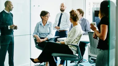 Group of professionals discussing in a conference room