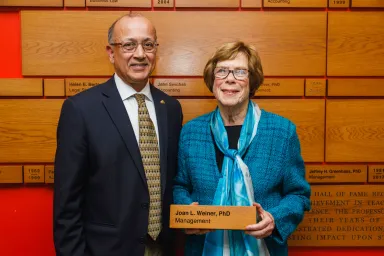 Joan L. Weiner and Vibhas Madan