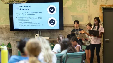 Girls in STEM participants give presentation.