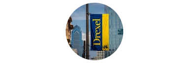 a vibrant Drexel banner with the Philadelphia skyline in the background
