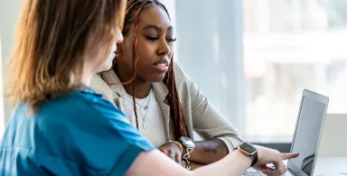 a LeBow graduate enrollment advisor walks a prospective student through options for their MBA