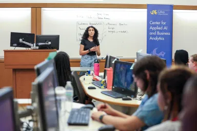 Girls in STEM students learn in classroom setting.
