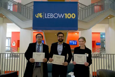 Drexel LeBow students hold certificates after participating in the F1C3 Case Competition.