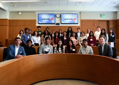 Students and Aramark employees celebrate the end of the 2024 Disruptor Games.