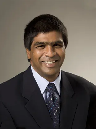 Headshot of Naveen Daniel