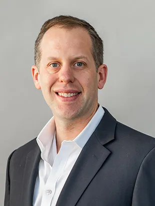 Headshot of  Matthew Schneider
