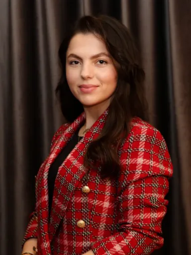 Headshot of Mirela Hima