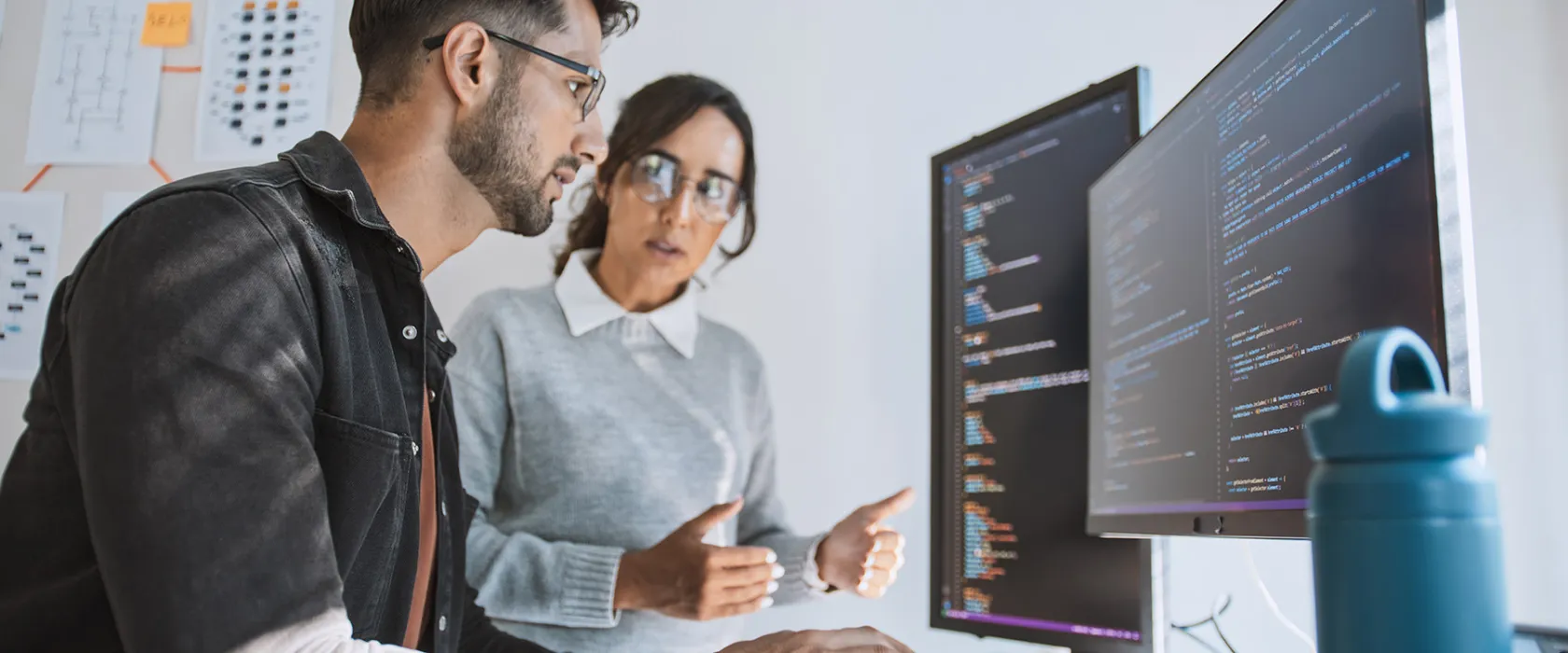 a professor helps an MS Economics and Data Science student run an analysis