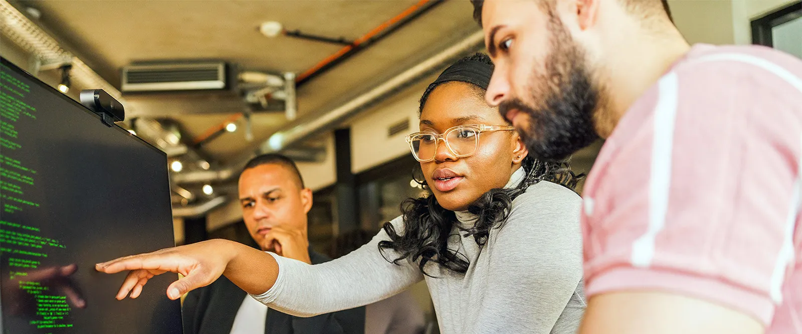 Drexel MS Economics and Data Science students reviewing data together