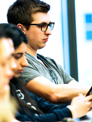 Accounting Students Listen in Class