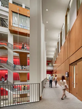 Gerri C. LeBow Hall staircase with faculty and students walking around