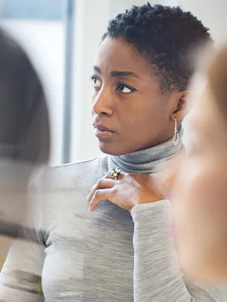 Woman listening in meeting