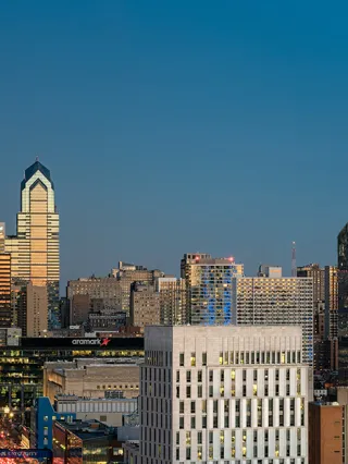 Philadelphia skyline at night with a view of Drexel's campus