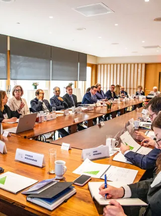 Governance in action, as leaders discuss issues around a board room table