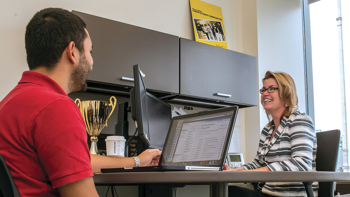 Drexel LeBow student talking with an academic advisor